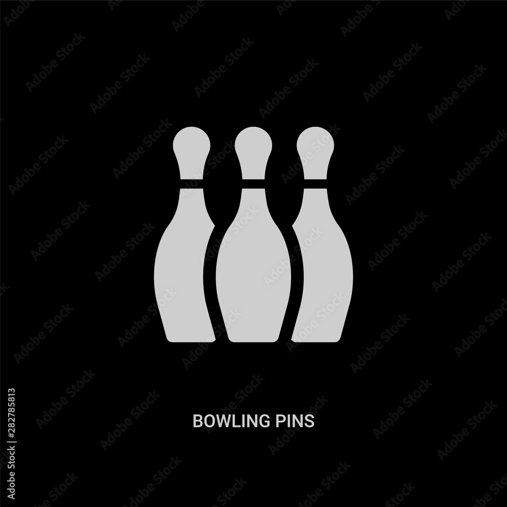Fototapeta premium white bowling pins vector icon on black background. modern flat bowling pins from entertainment and arcade concept vector sign symbol can be use for web, mobile and logo.