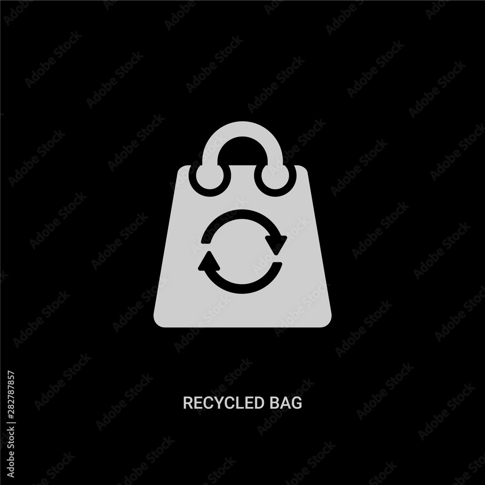Fotografie white recycled bag vector icon on black background