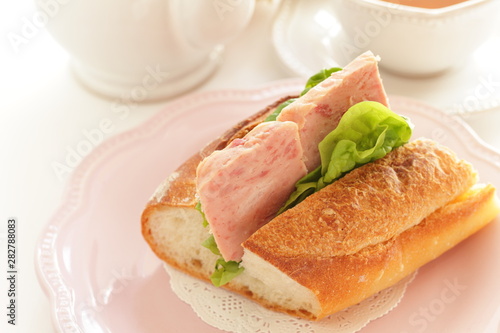 Homemade French bread and luncheon meat sandwich