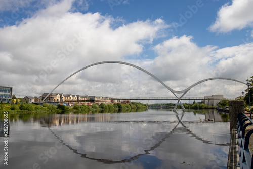 The famous Infinity Bridge located in Stockton-on-Tees taken on a bright sunny part cloudy day. © Duncan
