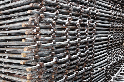 Steel reinforcement workpieces. Industrial background, building armature photo