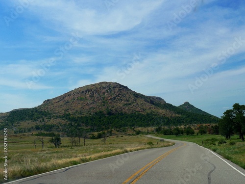 Medium wide shot of Mt Scott in the Wichita Mountains  Oklahoma.