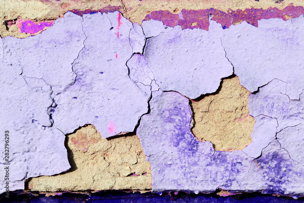 Old purple color wall with cracks close up. Abstract background Old purple color wall with cracks close up. Abstract background