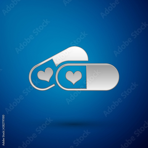 Silver Pills for potency, aphrodisiac icon isolated on blue background. Sex pills for men and women. Vector Illustration