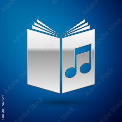 Silver Audio book icon isolated on blue background. Musical note with book. Audio guide sign. Online learning concept. Vector Illustration