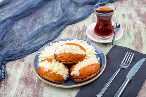 Traditional Turkish pastry pogaca with cheese filling. Turkish name: Sakalli, sacakli, corek - pogaca. photo