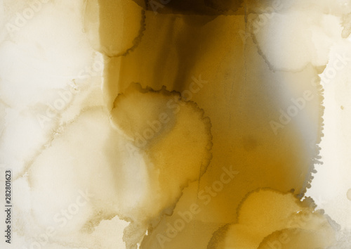 Hand painted gold alcohol ink background. Abstract delicate yellow texture. Contemporary wallpaper. 