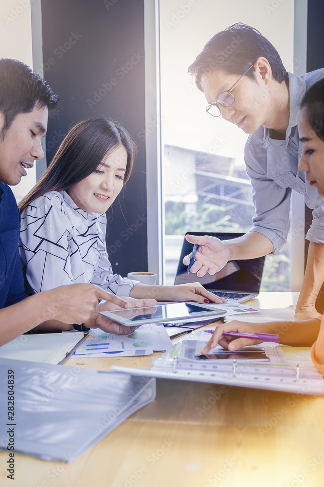Businessman using hand gesture while explain Business performance and discussion in the meeting. Businessman using hand gesture while explain Business performance and discussion in the meeting.