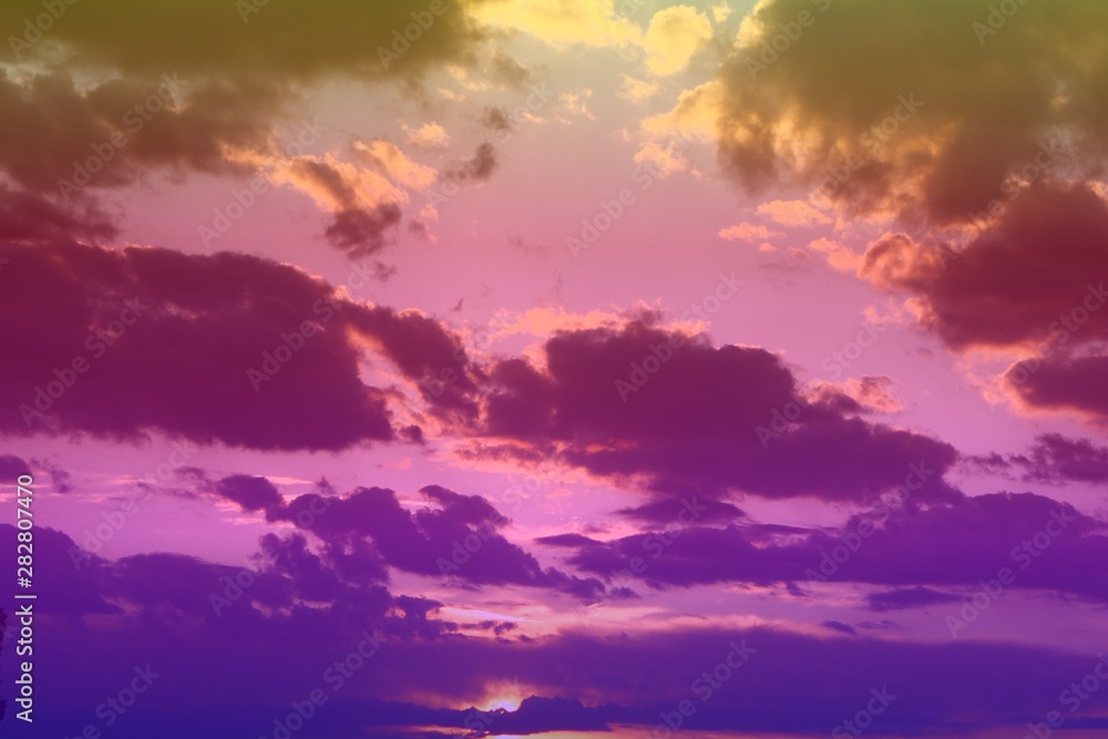 wonderful unreal vivid fantasy sun colored clouds for using in design as background.