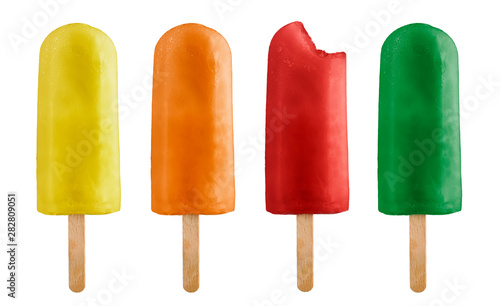 variety of fruits ice lolly with one bitten, isolated on white background