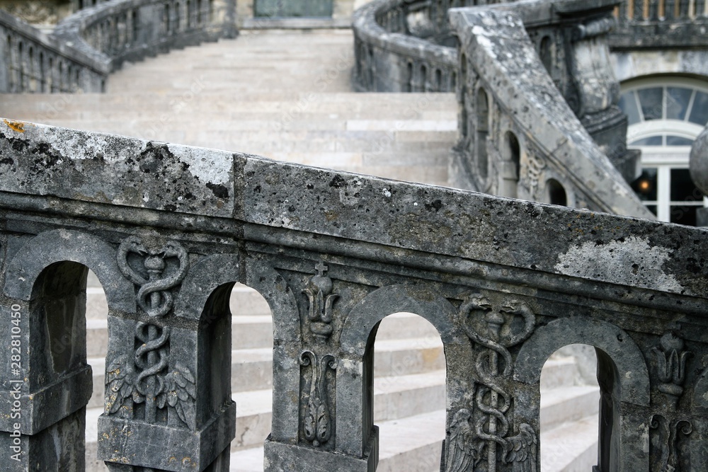 grey stone ornate balustrade in Fontainebleau  chateau