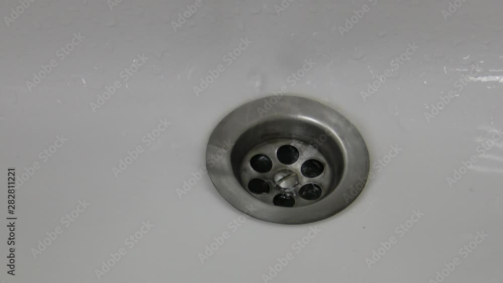 water flowing from faucet water flowing from faucet