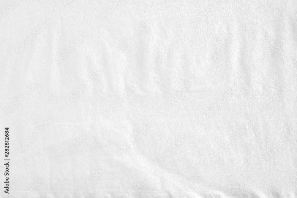 Closeup white crumpled thin toilet paper texture background. Stock