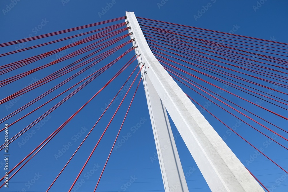Cable-stayed bridge on the Vistula river. Cars passing the bridge. Gdansk/Poland