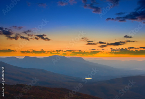 mountain silhouette in a blue mist at the dramatic twilight  natural outdoor background
