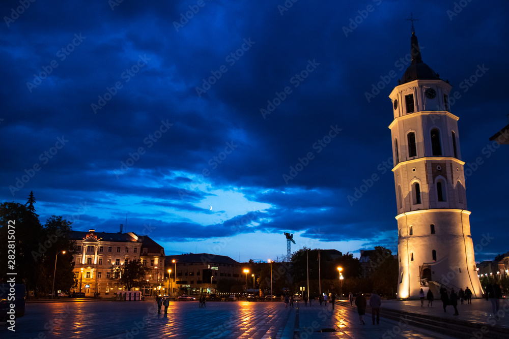 Vilnius, Lithuania. The View Of Cathedral Square With Bell Tower And Cathedral Basilica Of St. Stanislaus And St. Vladislav in summer at night with blue sky after the rain