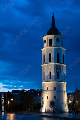 Vilnius, Lithuania. The View Of Cathedral Square With Bell Tower And Cathedral Basilica Of St. Stanislaus And St. Vladislav in summer at night with blue sky after the rain, vertical