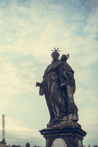 Anthony of Padua statue on Charles Bridge in Prague, Czech Republic. Medieval Gothic bridge, finished in the 15th century, crossing the Vltava River
