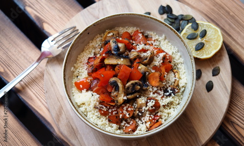 bright vegan dish with vegetables and couscous