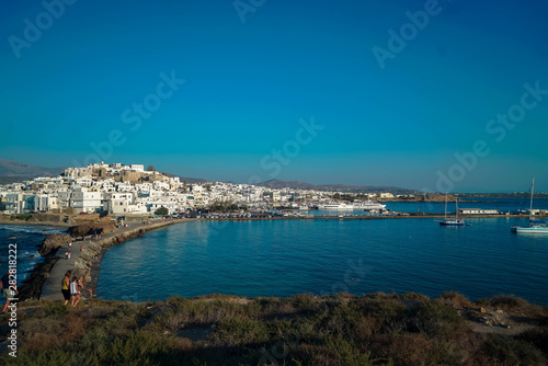 2 men playing bouzouki surrounded by the beauty of the island of Naxos