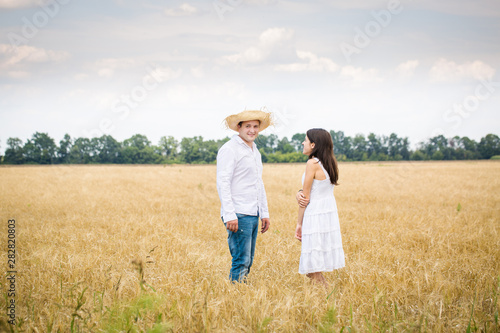 Cheerful couple on the field