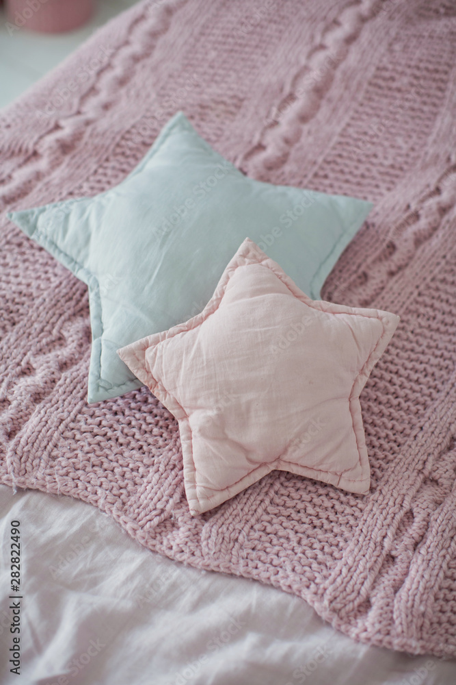 bed with pink and gray bedding and star shaped pillows bed with pink and gray bedding and star shaped pillows