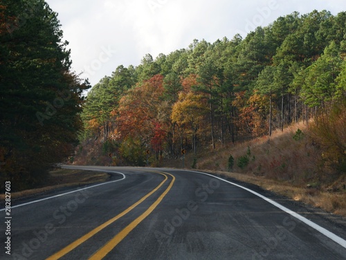 Scenic road with colorful trees at Fall © raksyBH