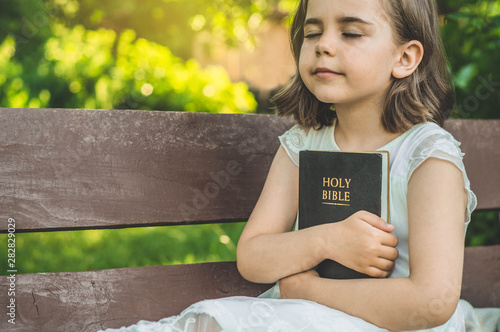 Valokuva Reading the Holy Bible in outdoors