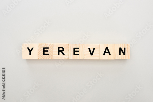 top view of wooden blocks with Yerevan lettering on white background