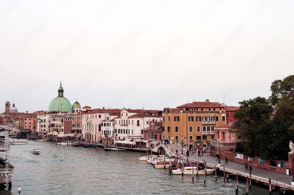 View of canals and gondolas Venice Italy