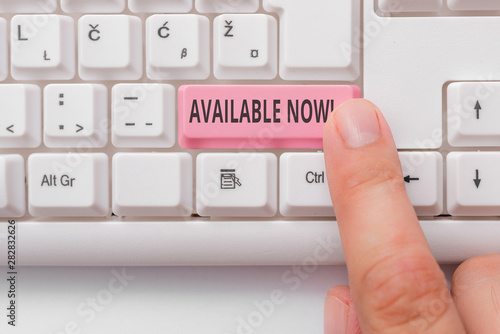 Text sign showing Available Now. Business photo showcasing you can find it obtain or operable at this current moment White pc keyboard with empty note paper above white background key copy space