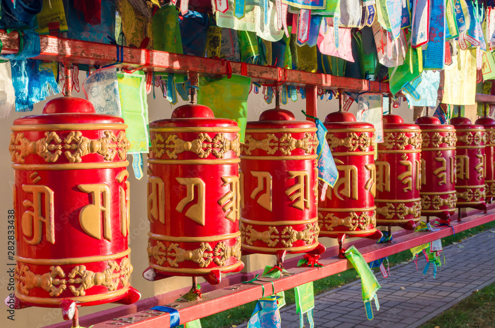 Fototapeta premium Buddhist prayer wheels in Buddhist Temple Datsan Gunzechoyney
