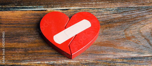 Quadro em tela A red heart with a plaster