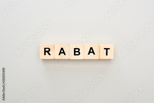 top view of wooden blocks with Rabat lettering on white background