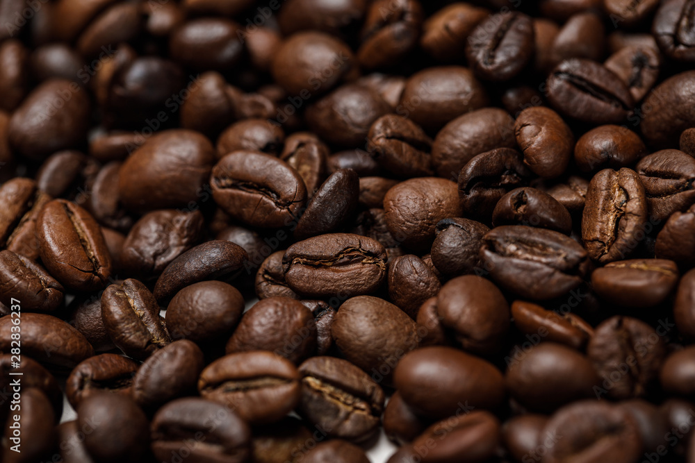 close up view of delicious fresh textured coffee grains close up view of delicious fresh textured coffee grains