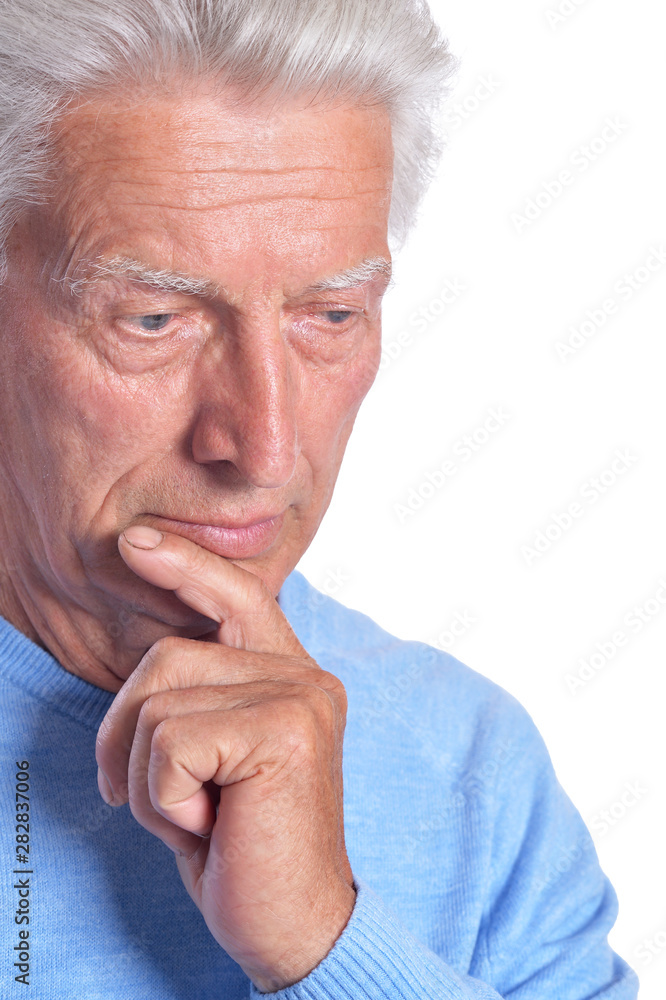 thoughtful senior man posing on white background thoughtful senior man posing on white background