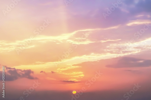 Dramatic atmosphere panorama view of beautiful sunset sky and cloud with golden sunlight in summer.