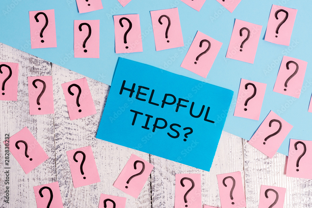 Word writing text Helpful Tips Question. Business photo showcasing secret information or advice given to be helpful knowledge Scribbled and crumbling papers with thick cardboard above wooden table Word writing text Helpful Tips Question. Business photo showcasing secret information or advice given to be helpful knowledge Scribbled and crumbling papers with thick cardboard above wooden table