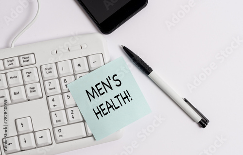 Handwriting text writing Men S Health. Conceptual photo state of complete physical mental and social well being by analysis White pc keyboard with empty note paper above white background