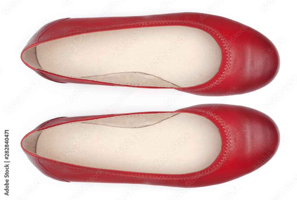 Female shoes on a white background. Top view. Female shoes on a white background. Top view.