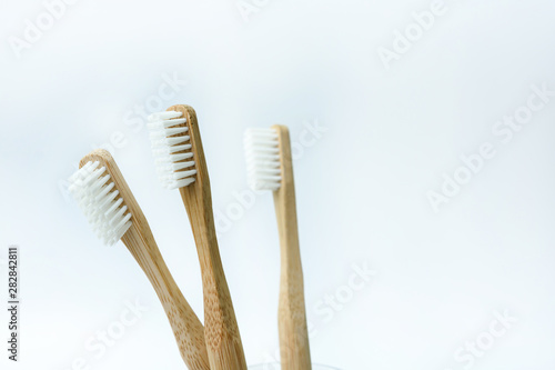 bamboo toothbrushes on white  background. Place for text. Ecoproduct. eco-friendly