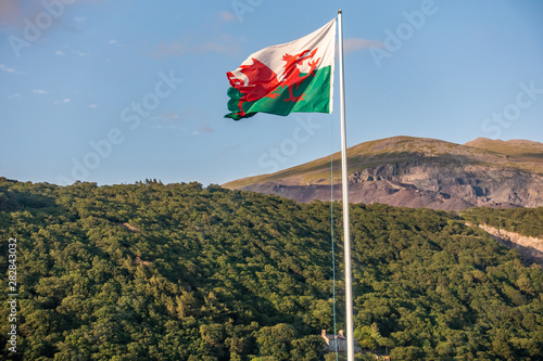 Welsh flag on the bank of Lake Padarn, Llanberis, North Wales