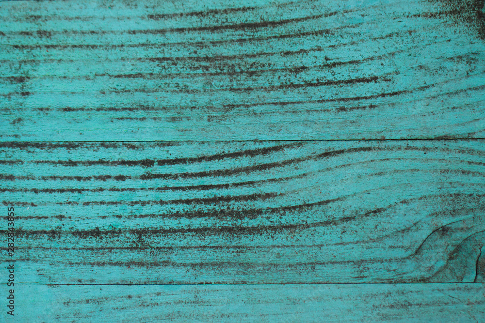 texture of an old wooden surface painted with turquoise paint texture of an old wooden surface painted with turquoise paint
