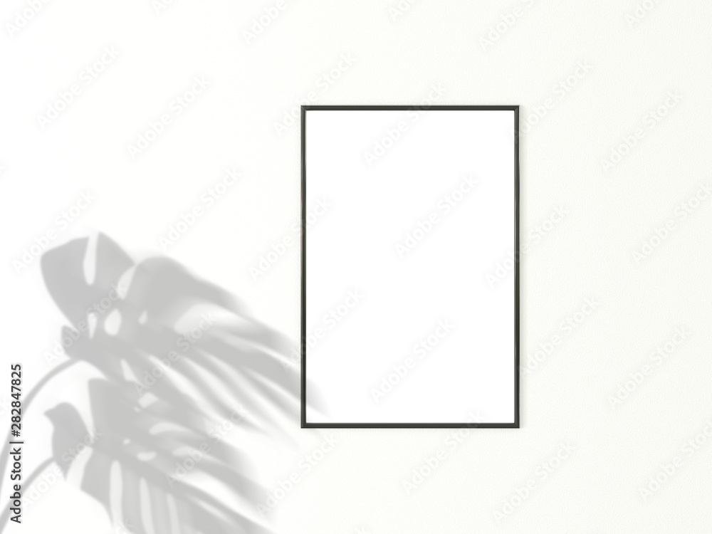 2x3 vertical Black frame for photo or picture mockup on white background with shadow of monstera leaves. 3D rendering. 2x3 vertical Black frame for photo or picture mockup on white background with shadow of monstera leaves. 3D rendering.