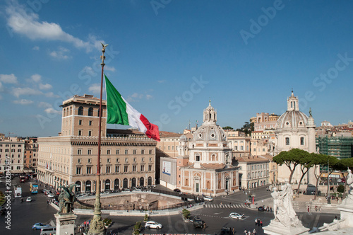 View of the city of Rome Italy with Italian flag