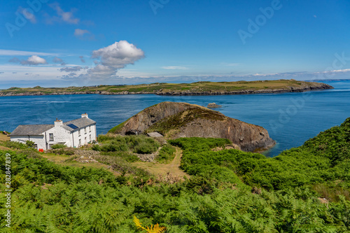 Bild auf Leinwand The white farm house and café on Ramsey Island RSPB nature reserve