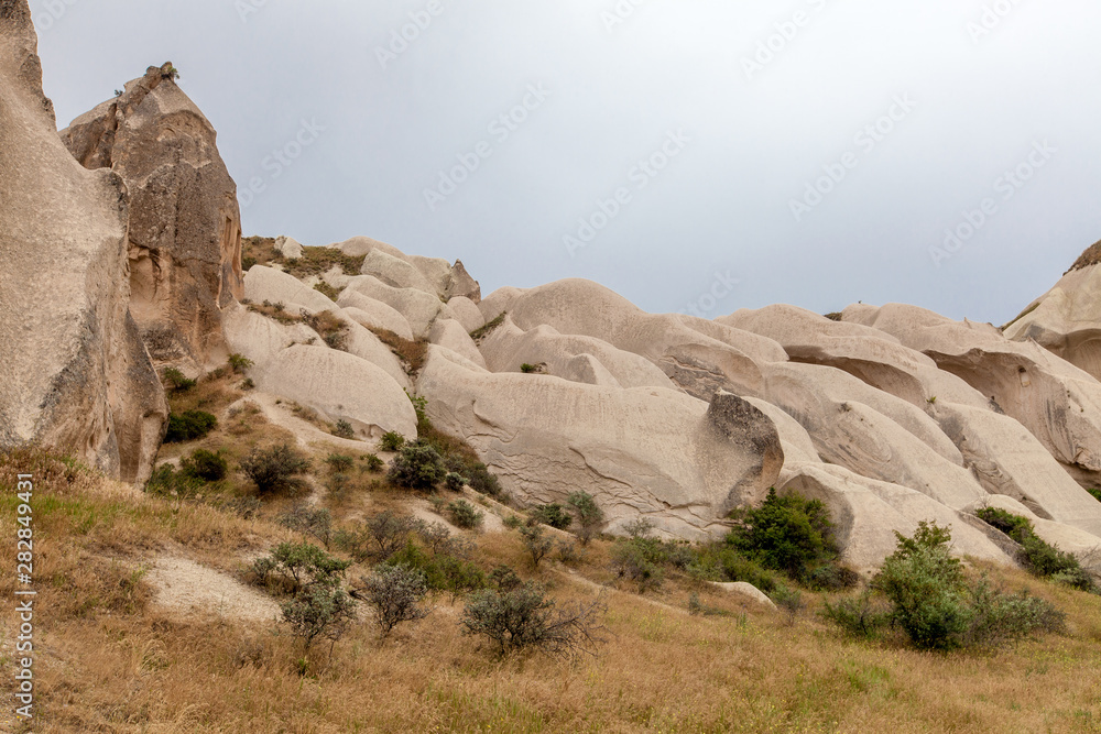 Beautiful mountains rocks landscape. Cloudy sky Beautiful mountains rocks landscape. Cloudy sky