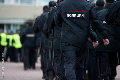 Russian police squad formation back view with