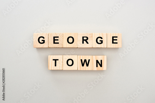 top view of wooden blocks with Georgetown lettering on grey background