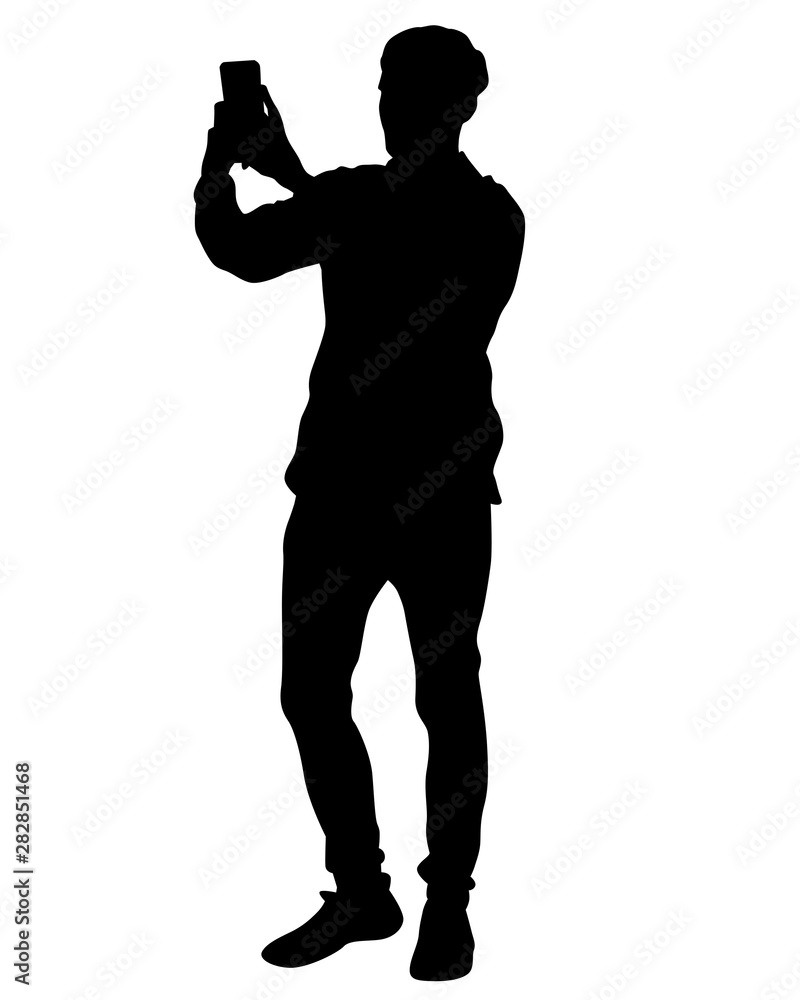 Man with a photo camera on white background